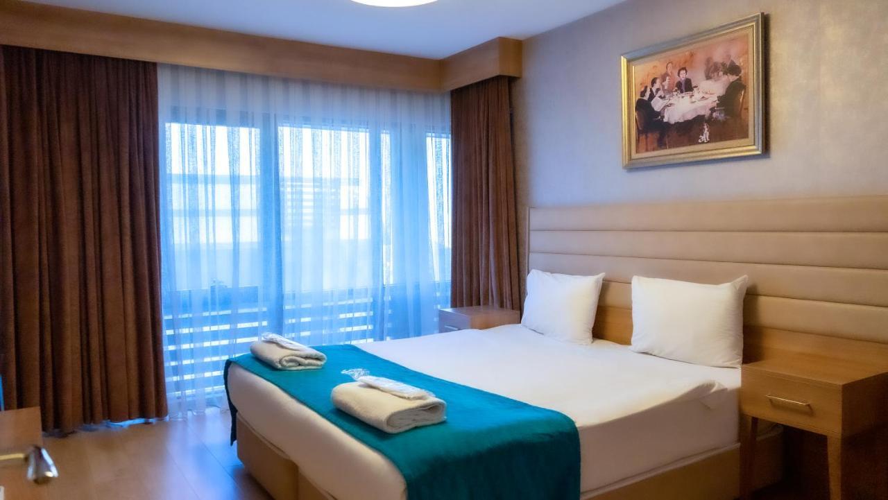 Bursa Suites Apart Otel Exterior foto A bedroom at the hotel